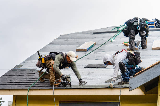Professional Roofing technician working in Greenland, NH